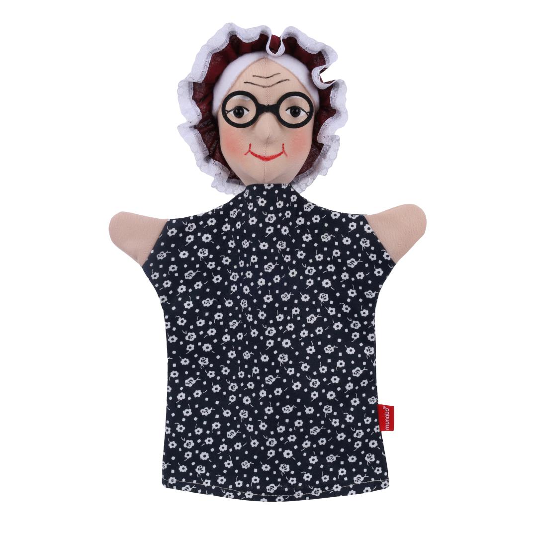 Grandmother hand puppet by munabo, front view with a dark red bonnet edged in white lace, round glasses and a floral dress.