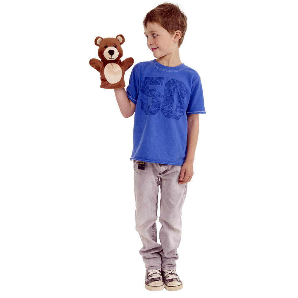 Boy holding the The Puppet Company baby hand puppet bear on his hand, usage example