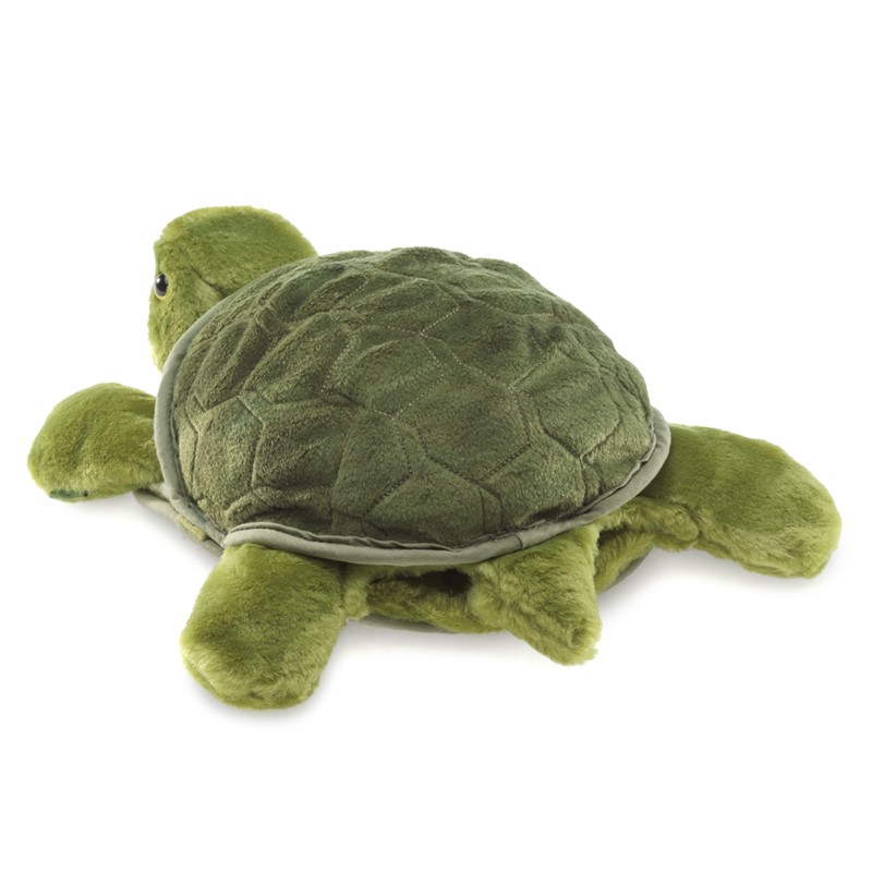 Green Folkmanis turtle hand puppet with textured shell and soft flippers, seen from the side.