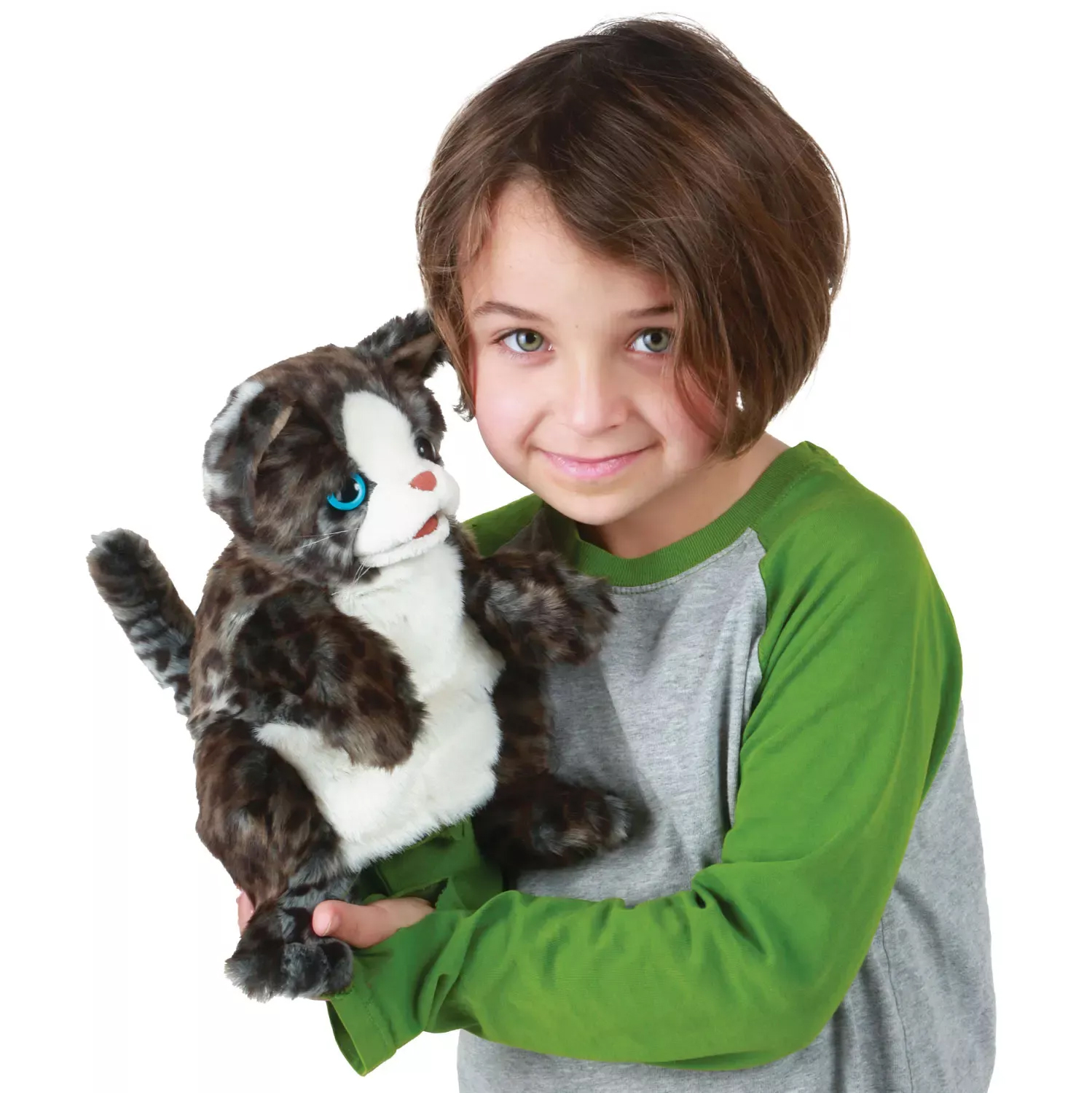 Child holding the Folkmanis wildcat kitten hand puppet with dark spotted fur and blue eyes in their arms