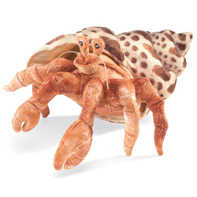Folkmanis hermit crab hand puppet in rust brown with detailed texture and spotted shell, front view