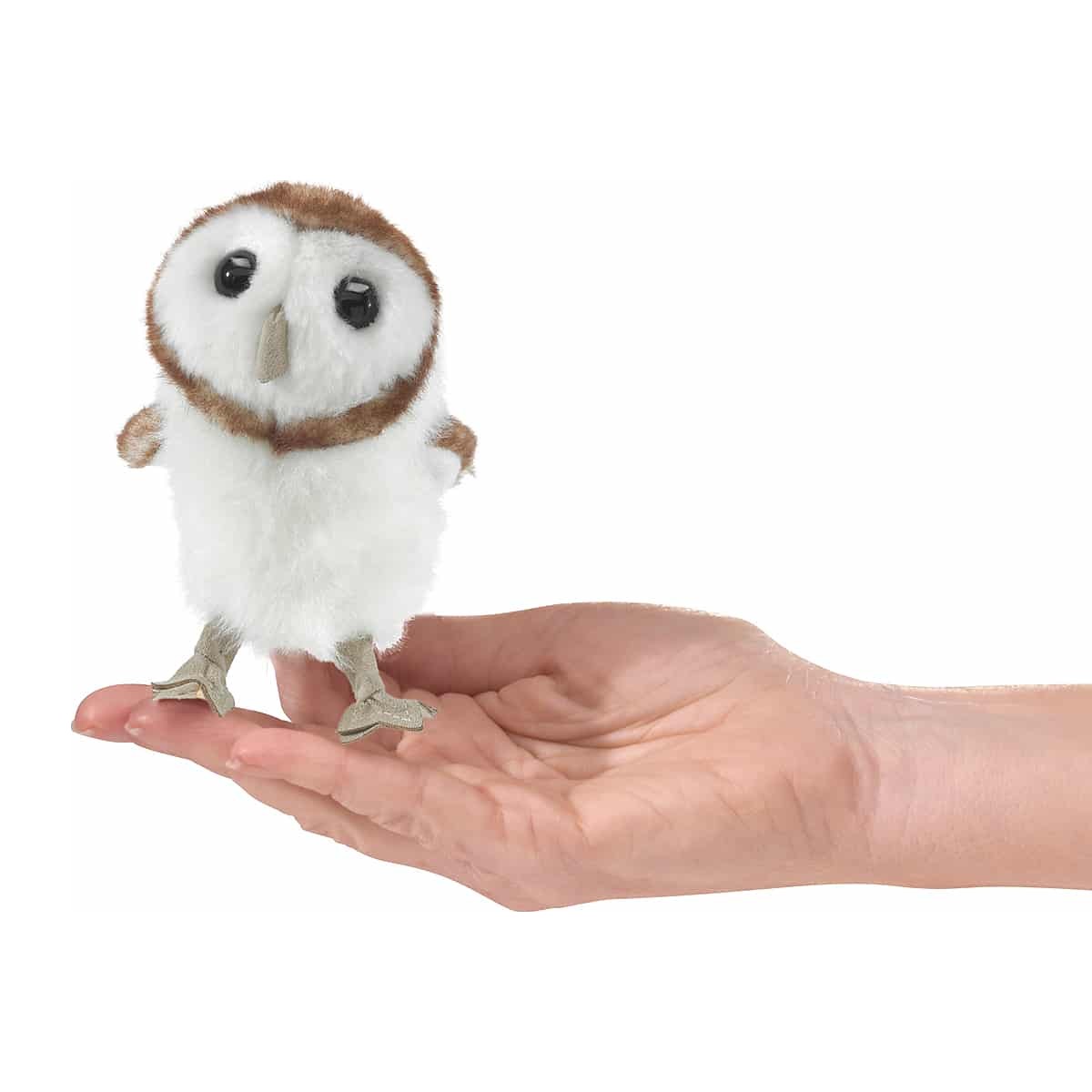 Folkmanis mini barn owl finger puppet with white belly and brown back, balancing on a flat hand