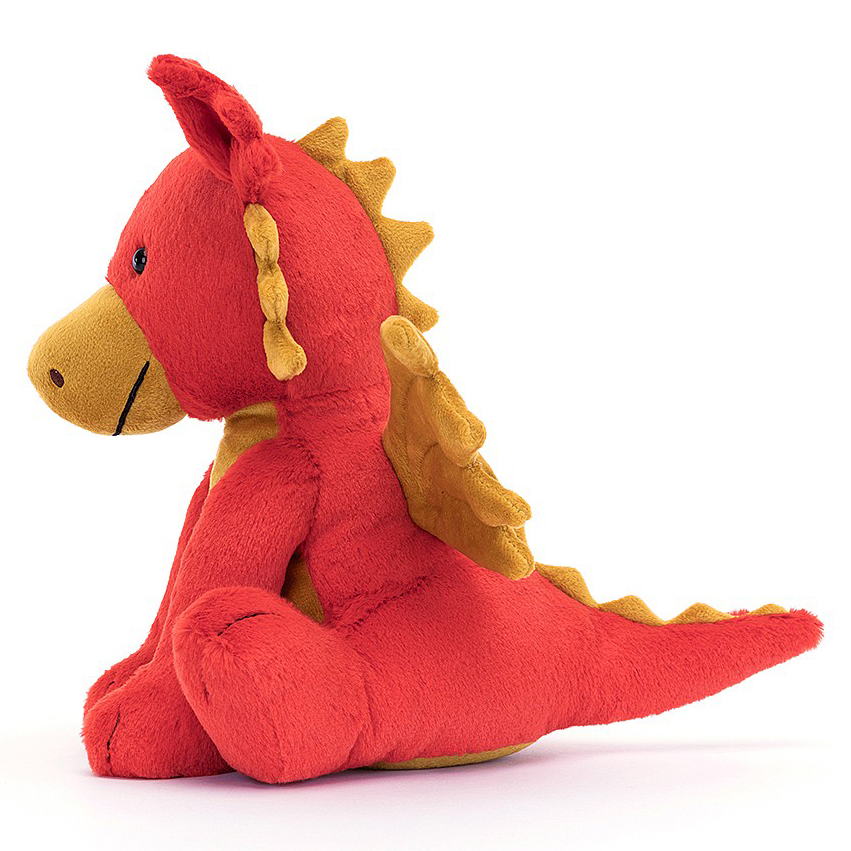 Jellycat plush toy dragon Darvin, red plush toy with golden wings, sitting, side view
