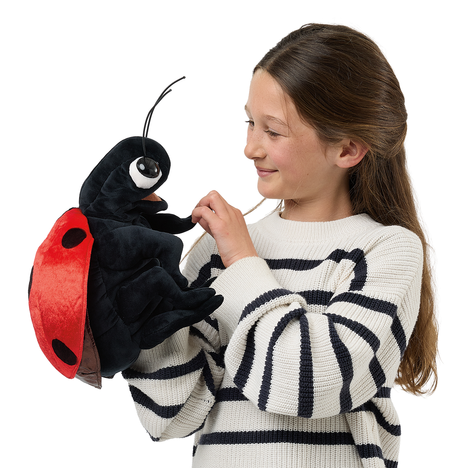 Folkmanis ladybird hand puppet held by a girl by one antenna, its mandibles open.