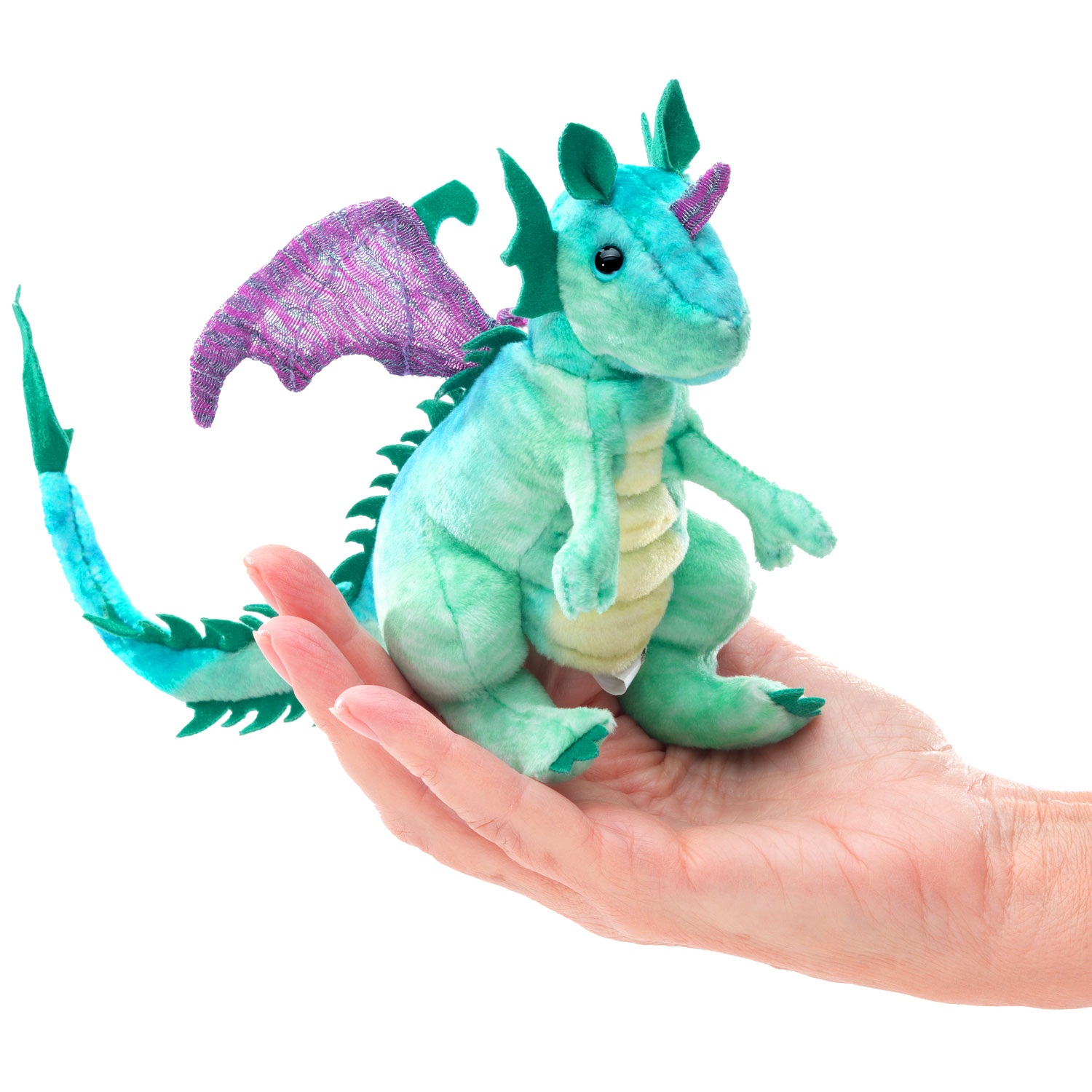 Folkmanis mini dragon finger puppet in turquoise mint with purple wings, balancing on a palm for size comparison