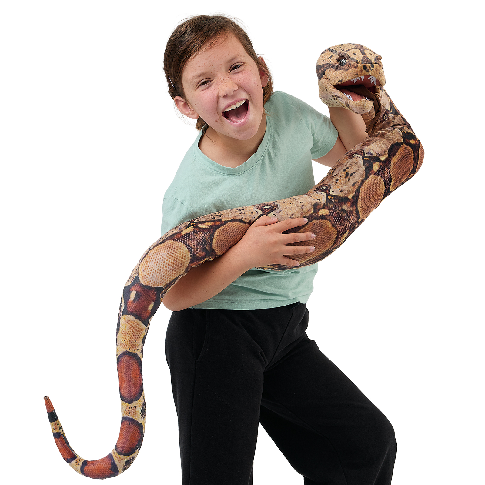 Folkmanis boa constrictor hand puppet coiled around a girl's arm, its head raised with the mouth open.