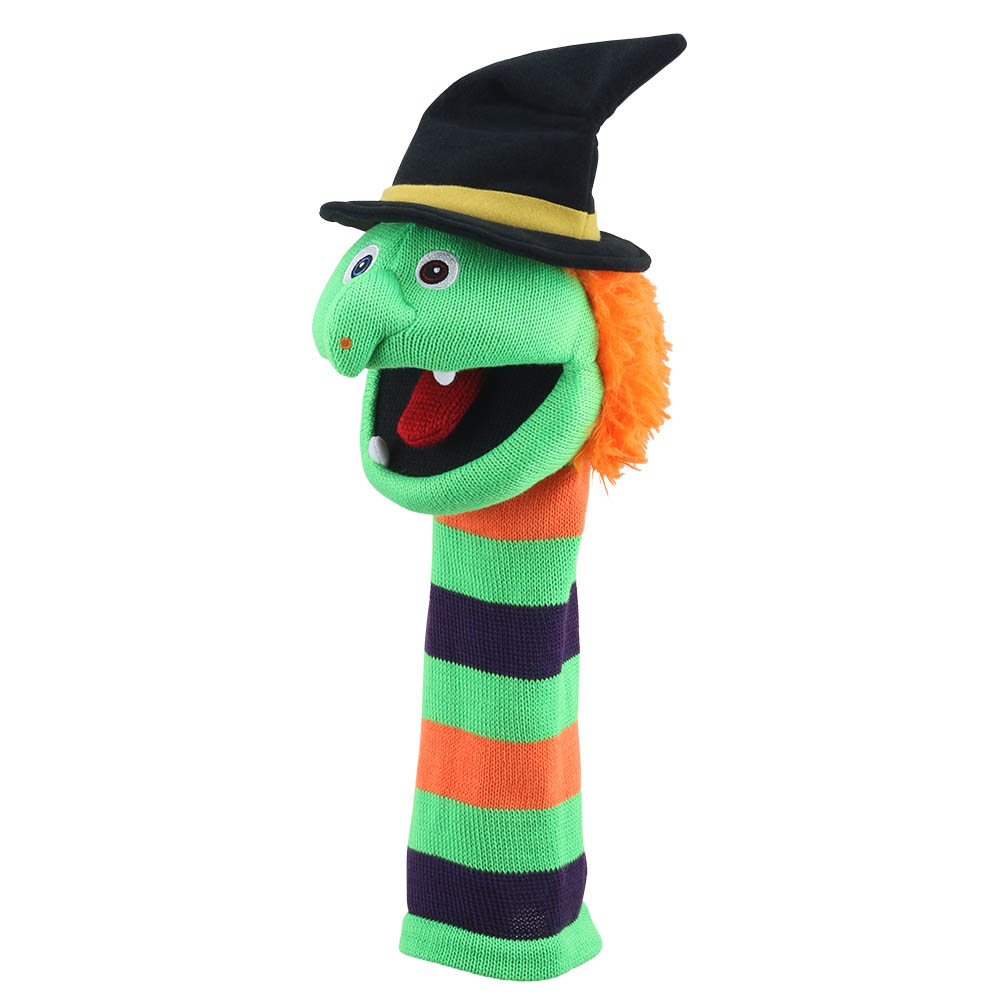 Puppet Company Witch Wilma monster sock puppet at a three-quarter angle, mouth wide open showing a pointed tooth beneath the black witch's hat