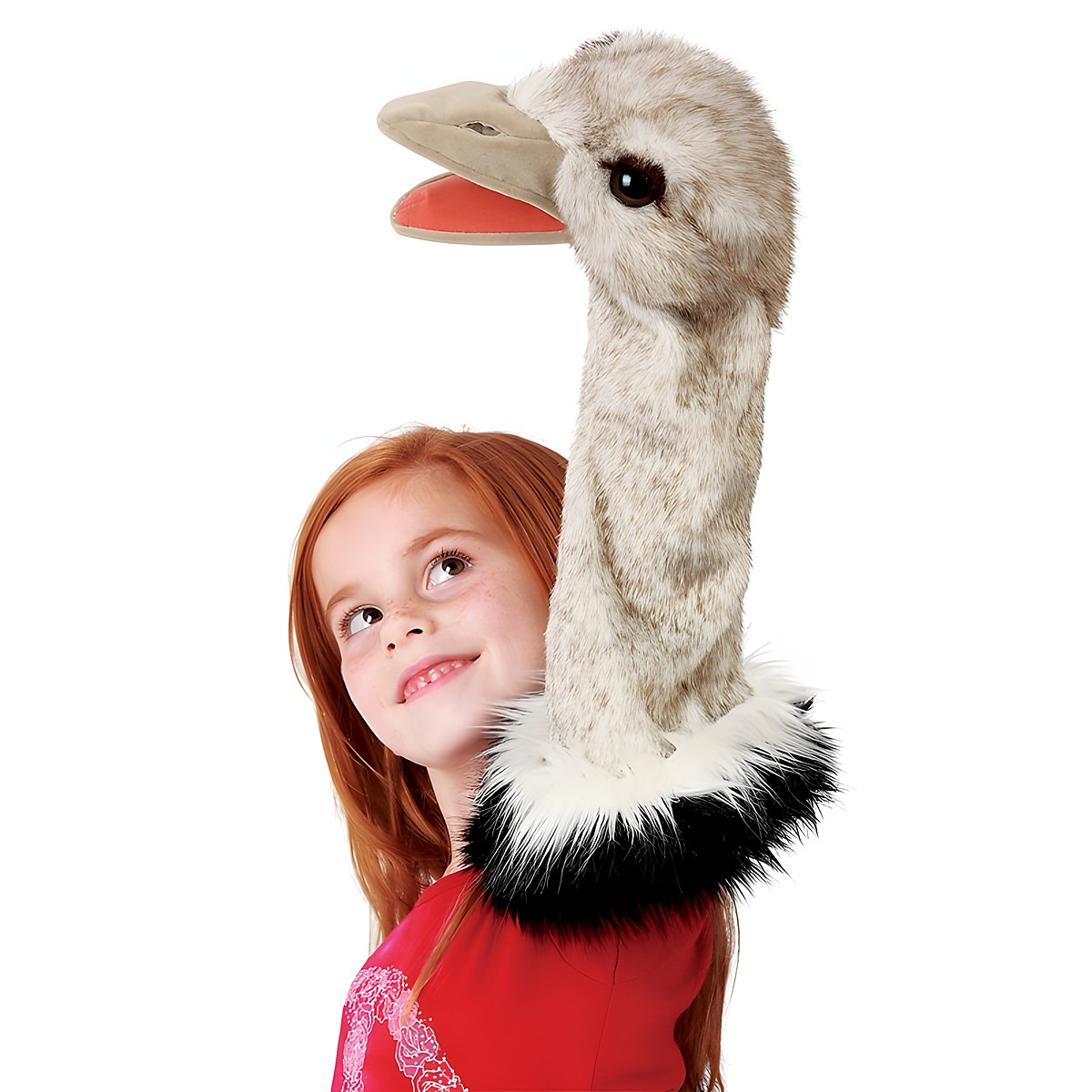 Folkmanis ostrich hand puppet with a long grey-speckled neck and open beak, held up high by a girl