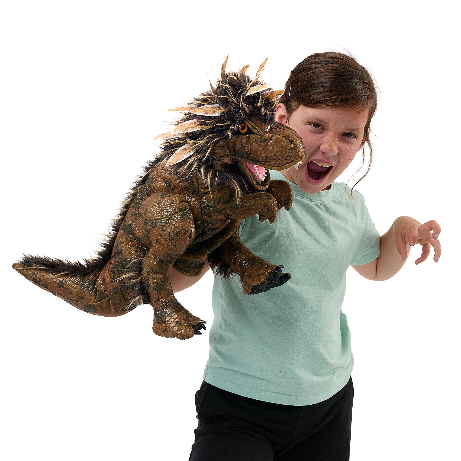 Folkmanis feathered Tyrannosaurus Rex hand puppet on the arm of a running girl, its mouth open showing the teeth.