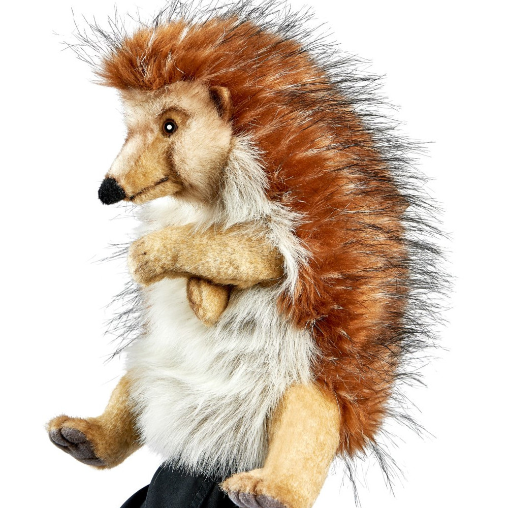 Hedgehog hand puppet by Hansa Creation with bristly brown spines and a light belly, side view