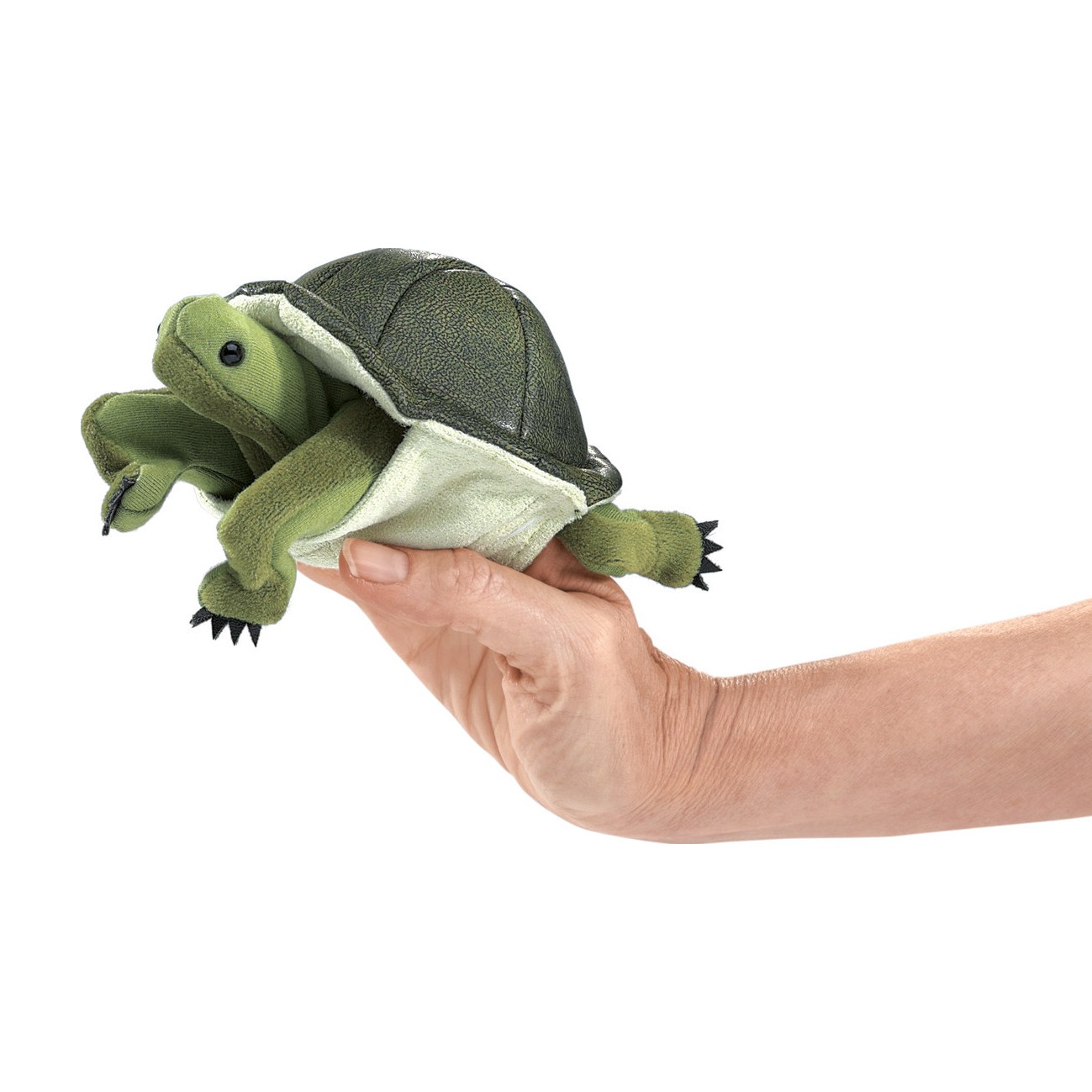 Folkmanis mini turtle finger puppet in green on a hand, with textured shell and movable head