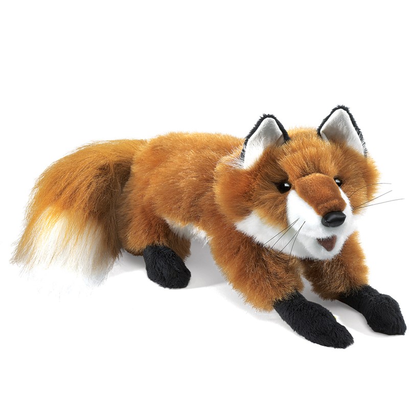 Folkmanis small red fox hand puppet in a lying pose, with red-brown fur, black paws and a bushy tail