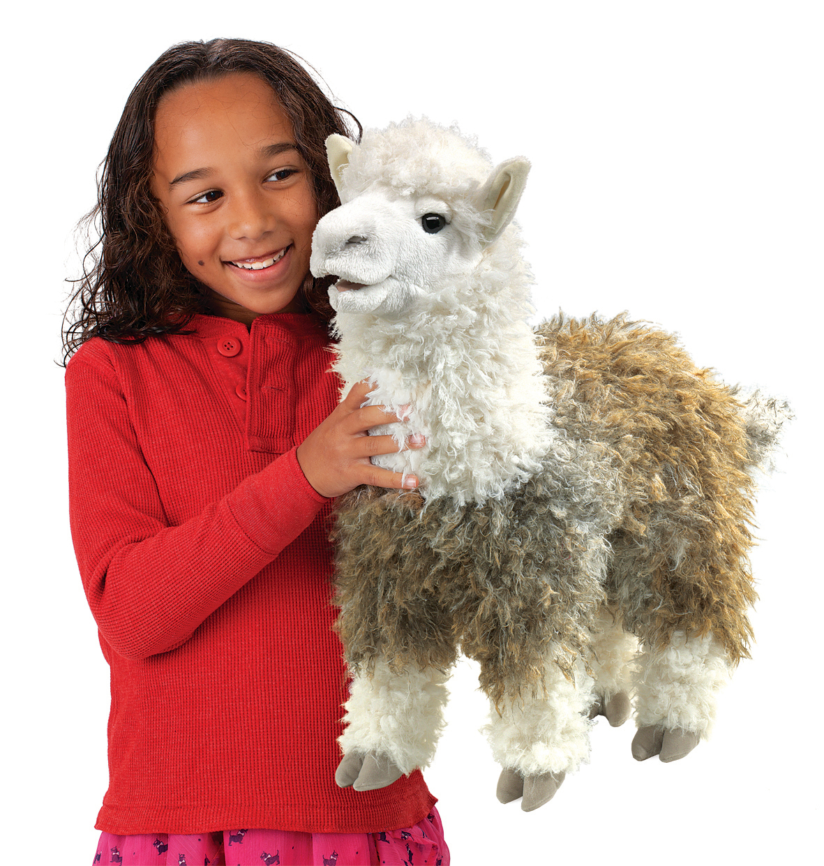 Folkmanis alpaca hand puppet with curly white and grey-brown fur, held in a girl's arms, side view