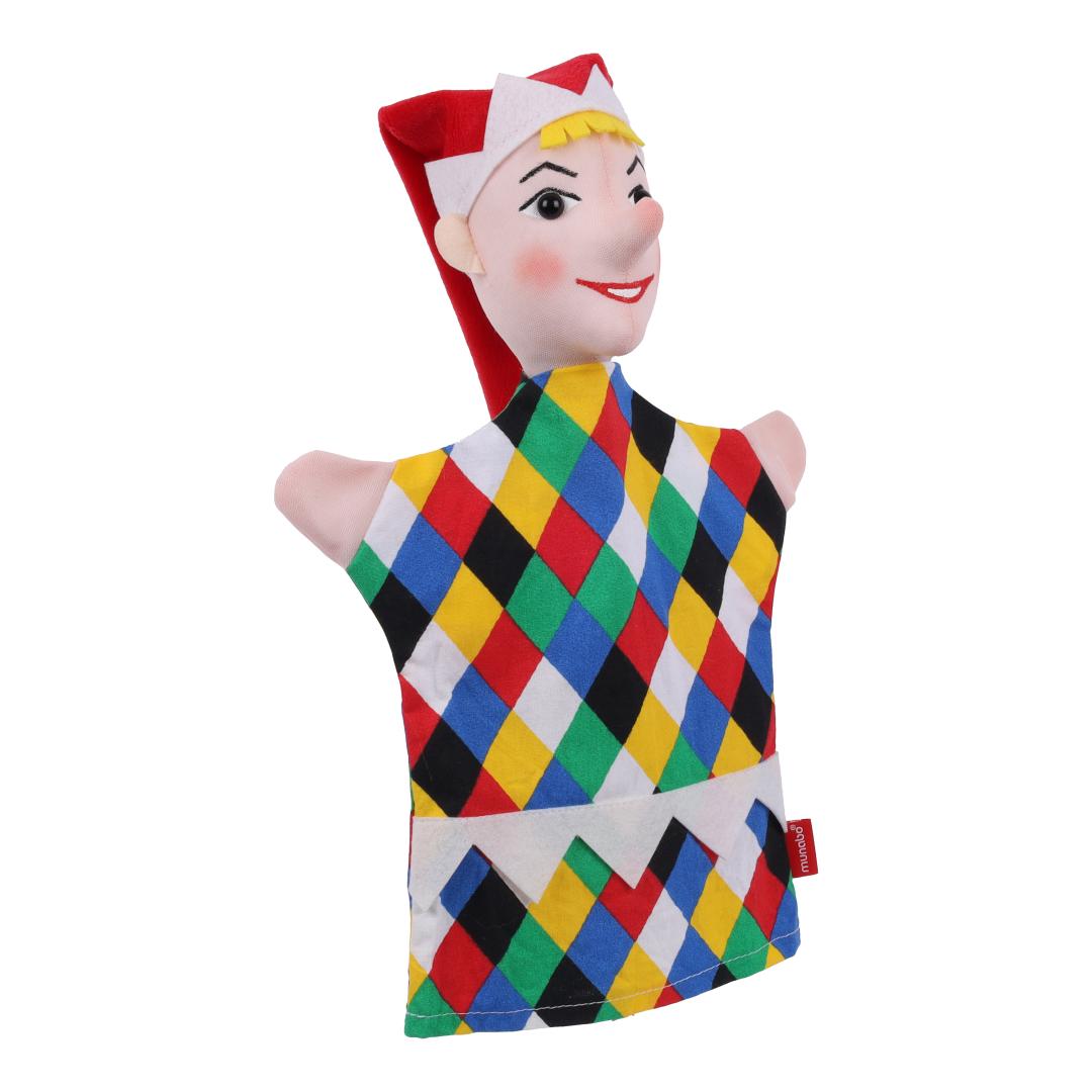 Kasper hand puppet by munabo, turned slightly with a broad grin and white-edged cap.