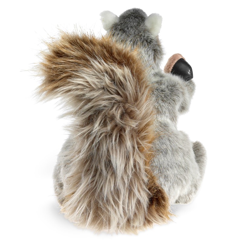 Folkmanis grey squirrel hand puppet seen from behind with a bushy brown-grey tail and an acorn in its paw