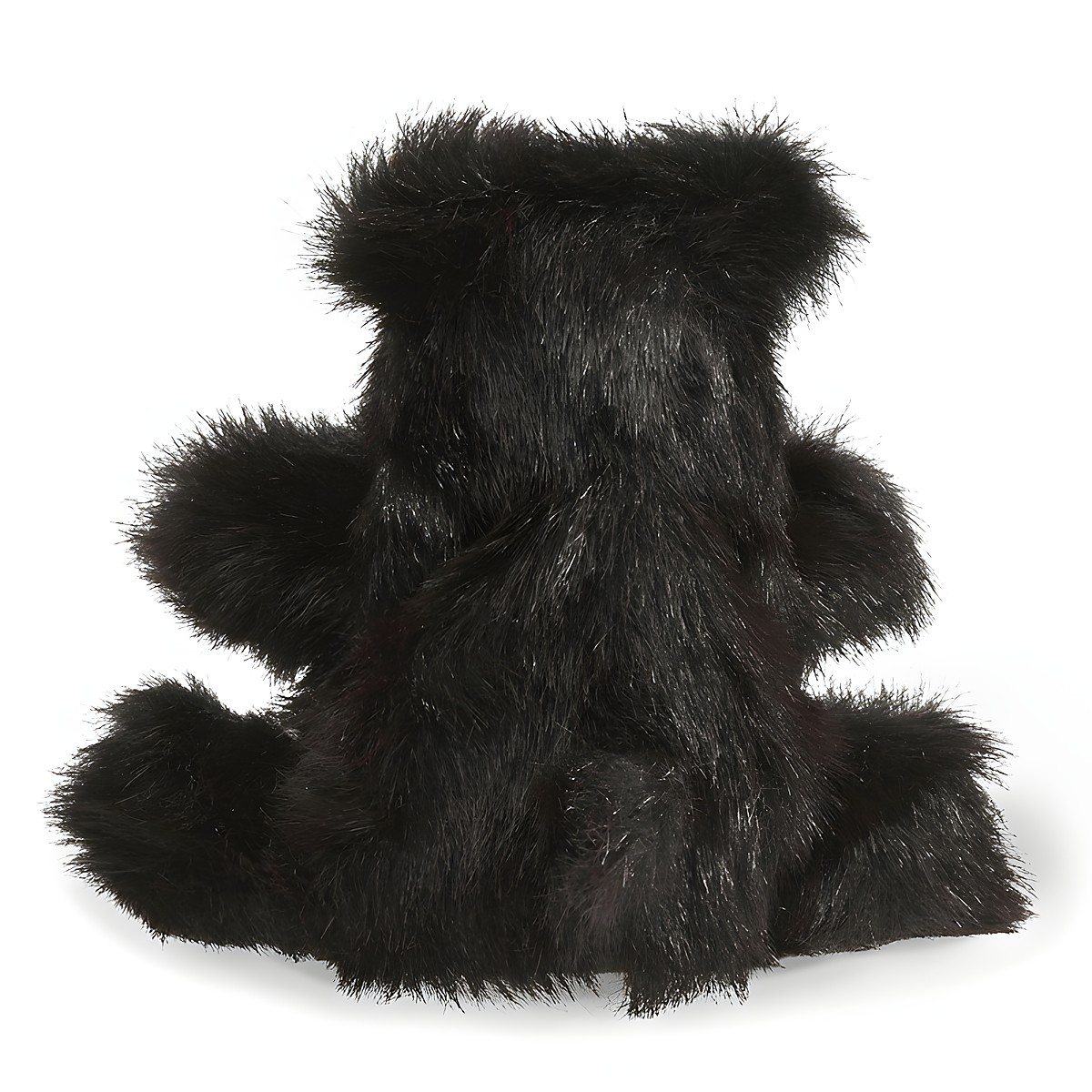 Folkmanis hand puppet small black bear with shaggy black fur, photographed from behind in a sitting position