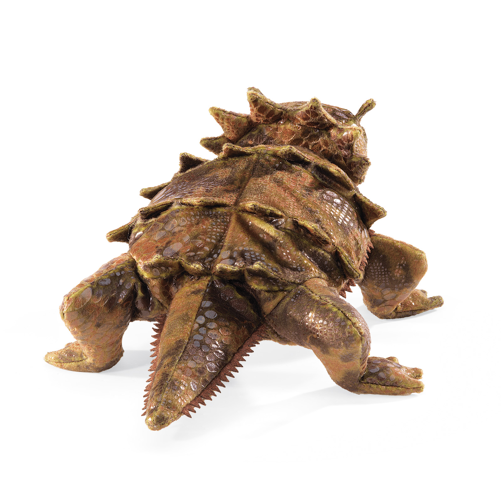 Folkmanis horned lizard hand puppet with textured scaled plush in brown-olive tones, spiky back and serrated tail, shown from a diagonal angle