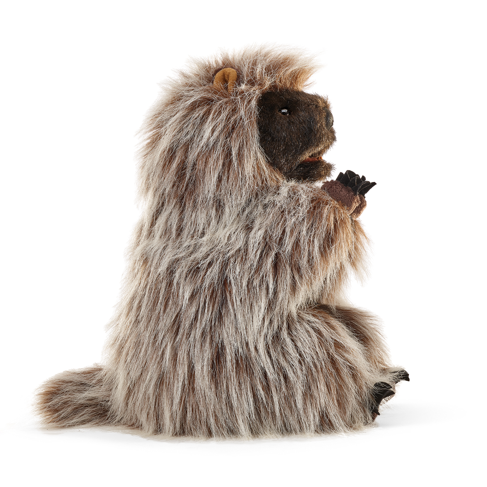 Folkmanis standing porcupine hand puppet shown side-on, its front paws held close together.