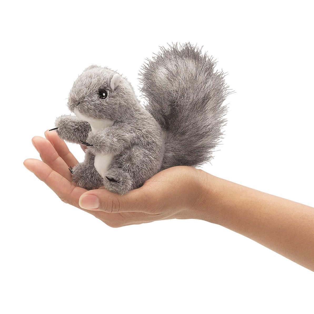 Folkmanis mini grey squirrel finger puppet sitting upright on a palm with a bushy tail