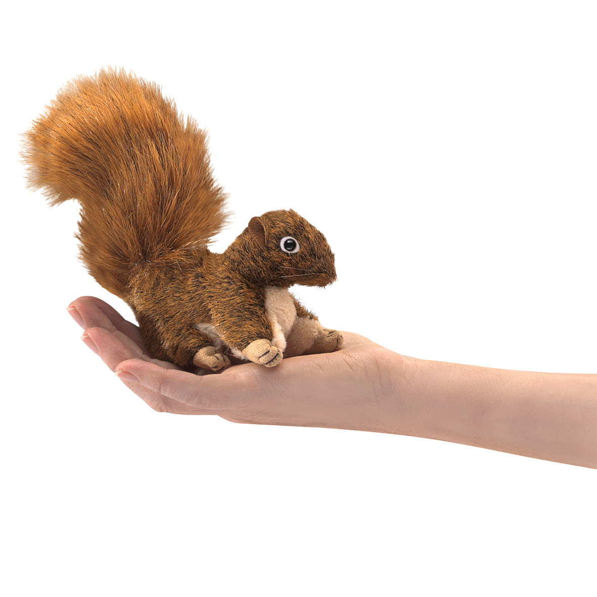Folkmanis mini reddish-brown squirrel finger puppet with a bushy tail resting on an open palm