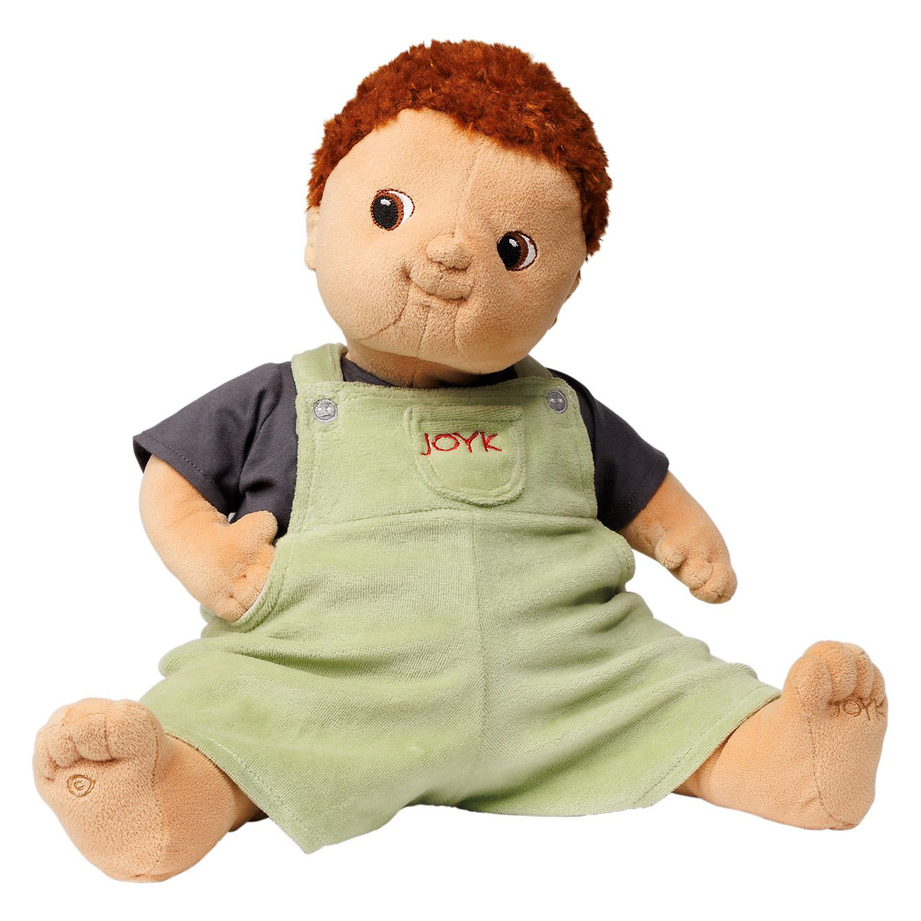 Joyk empathy doll Tom with red curly hair, grey shirt and light green dungarees, sitting