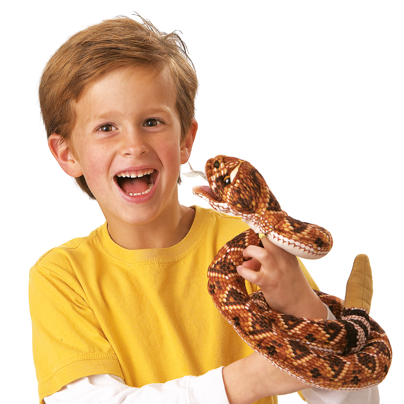 Boy laughing while wearing a Folkmanis rattlesnake hand puppet with brown scale pattern, rattle tail, and movable mouth on his arm