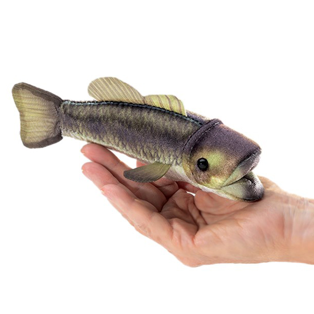 Folkmanis mini largemouth bass finger puppet lying on a palm, naturalistically printed plush in green-grey with fins