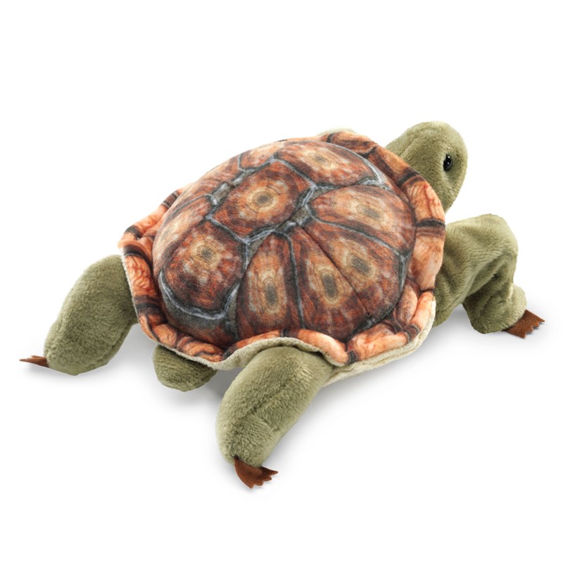 Folkmanis mini tortoise finger puppet with a detailed patterned brown shell and olive-green limbs, shown at an angle