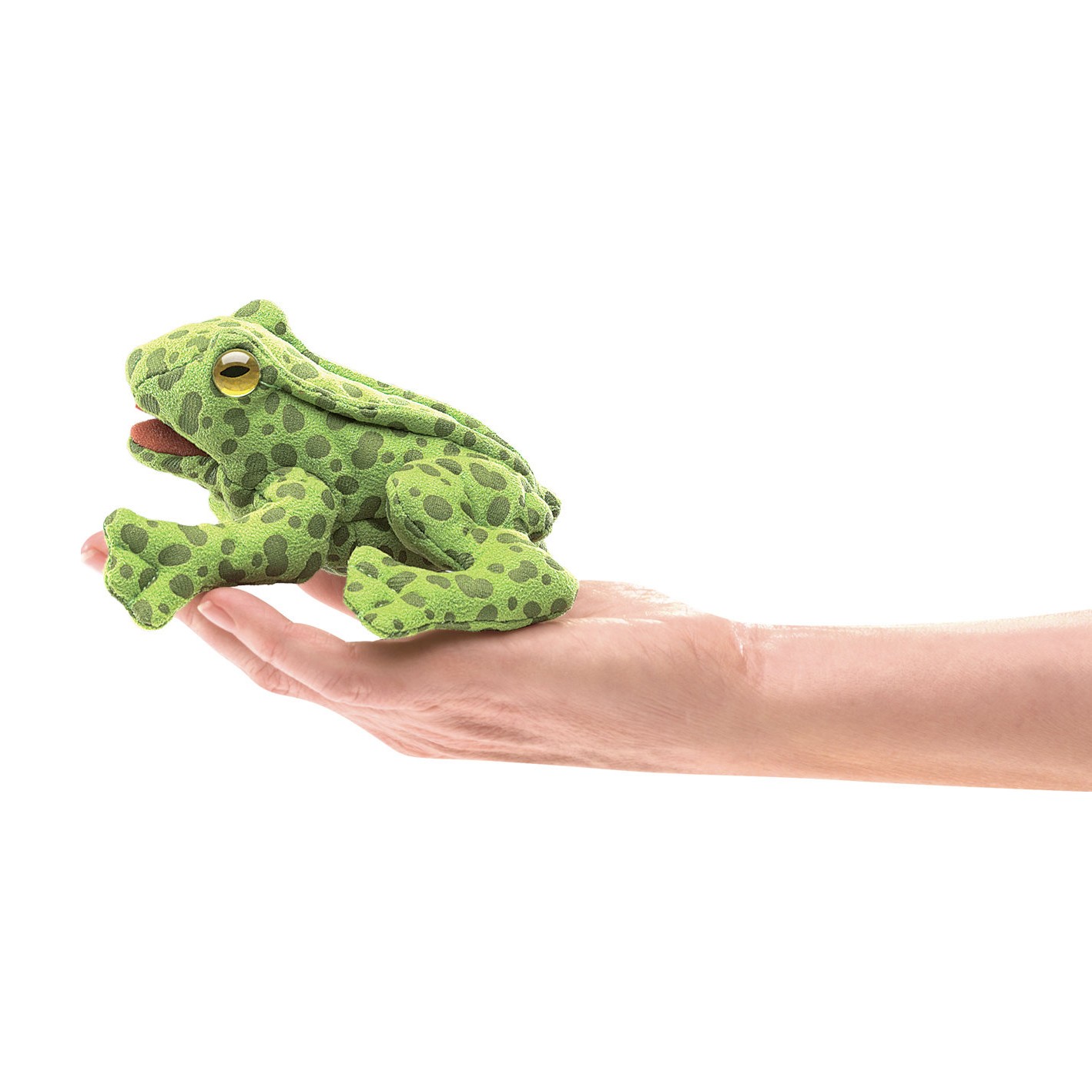 Folkmanis mini frog finger puppet in light green with dark green spots, lying on a hand, side view