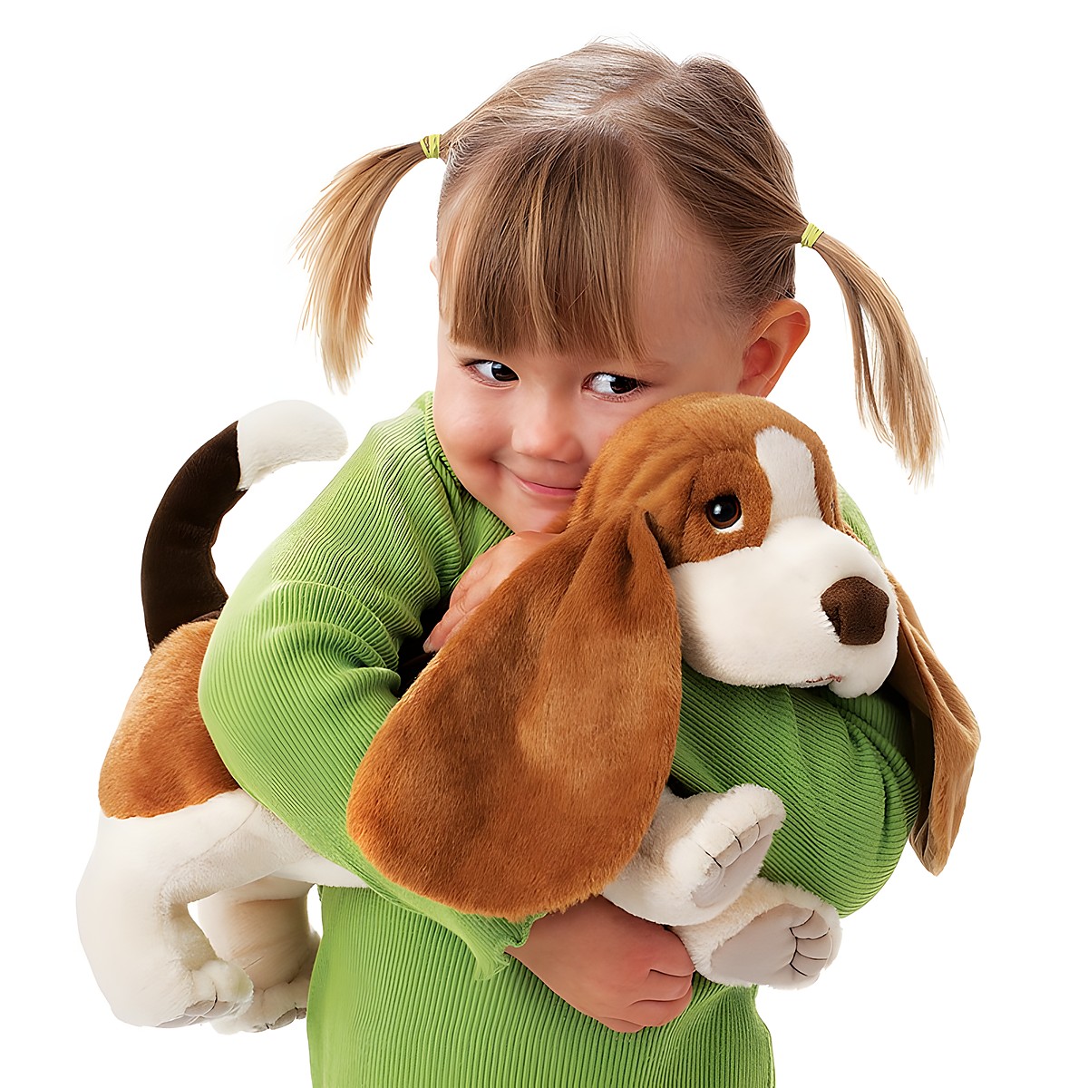 Young girl hugging the Folkmanis Basset Hound hand puppet with long floppy ears and brown-and-white fur