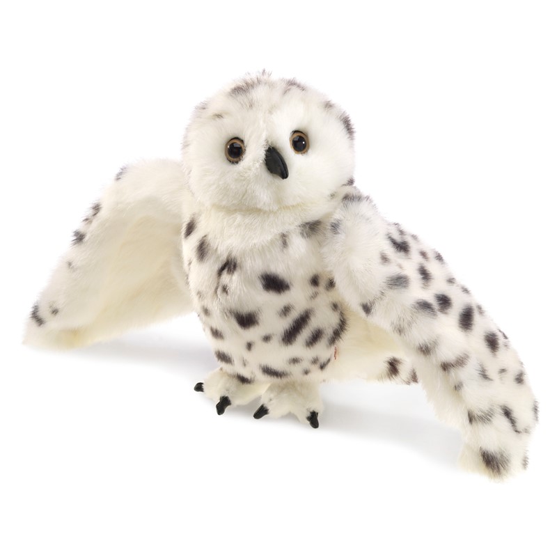 Folkmanis snowy owl hand puppet with spread wings, white plush with black spots and amber glass eyes