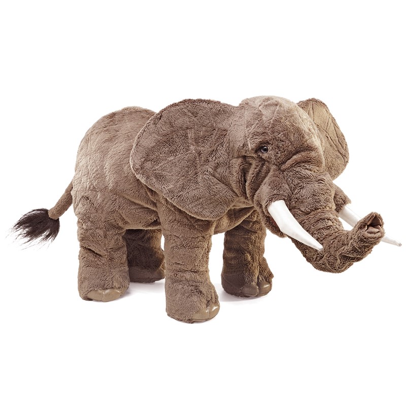 Folkmanis elephant hand puppet in grey plush, standing with movable trunk and white tusks, side view