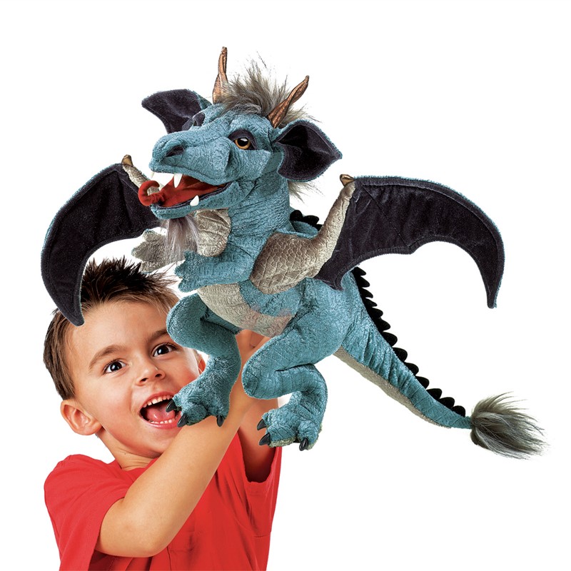 Folkmanis Sky Dragon hand puppet in blue-grey with black wings, operated by a child on an outstretched arm