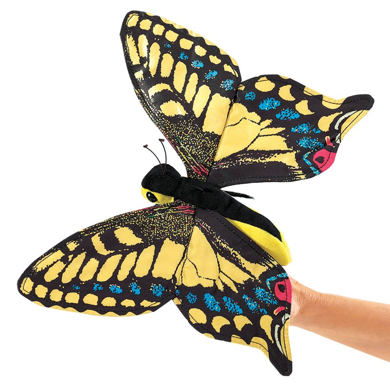 Folkmanis swallowtail butterfly hand puppet with yellow-and-black wings and blue spots, sitting on a hand