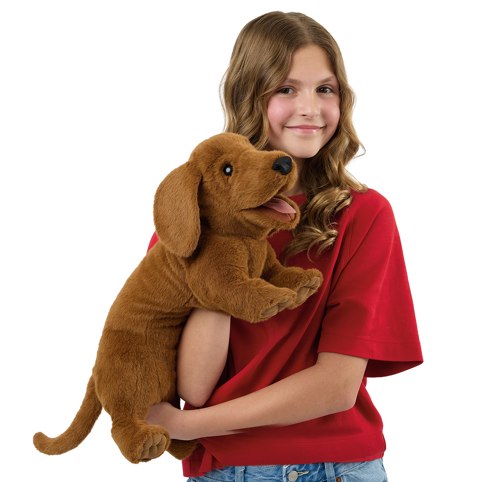 Folkmanis dachshund hand puppet on a girl's arm, a front view with its mouth open.