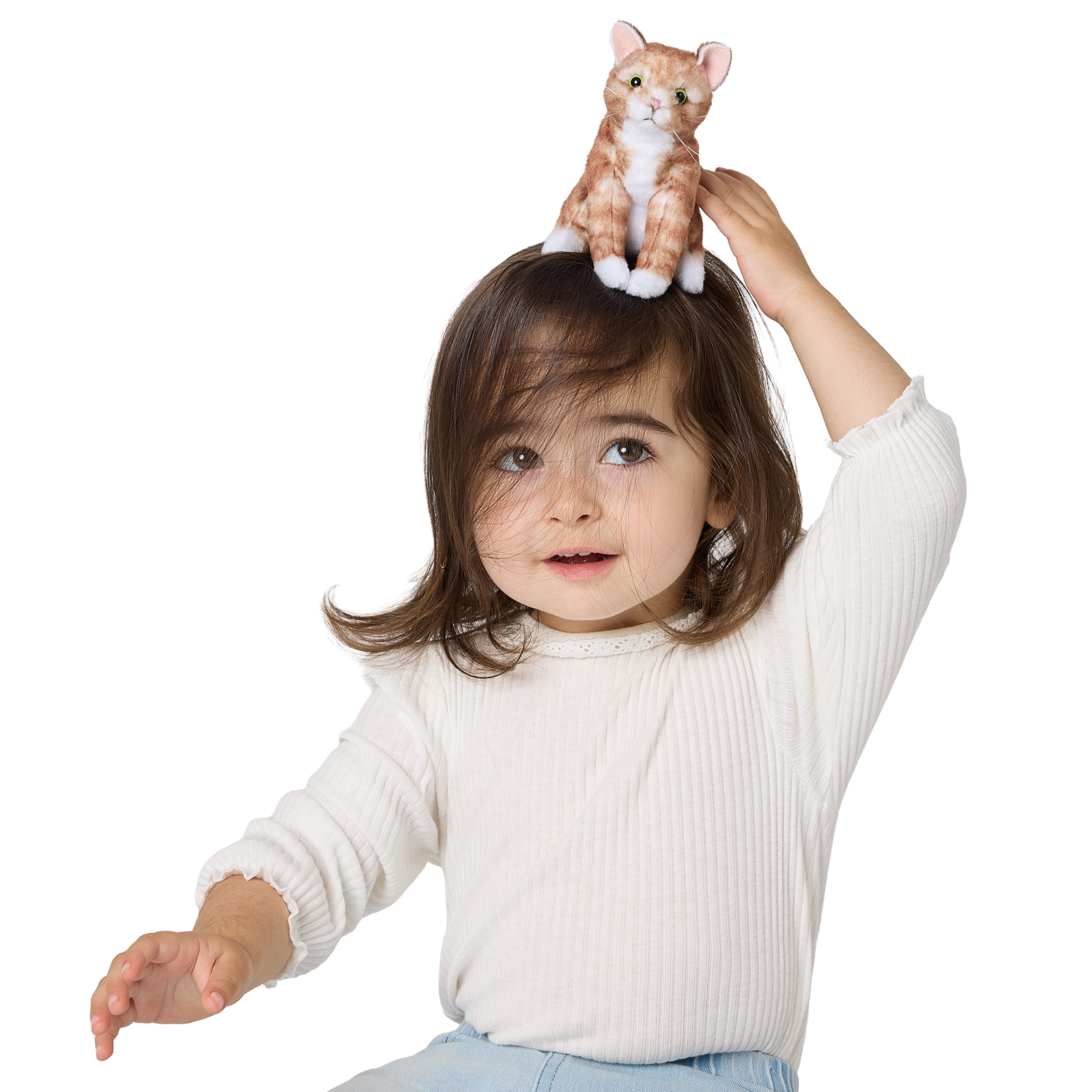 Folkmanis mini orange tabby cat finger puppet with white paws balanced on top of a toddler's head