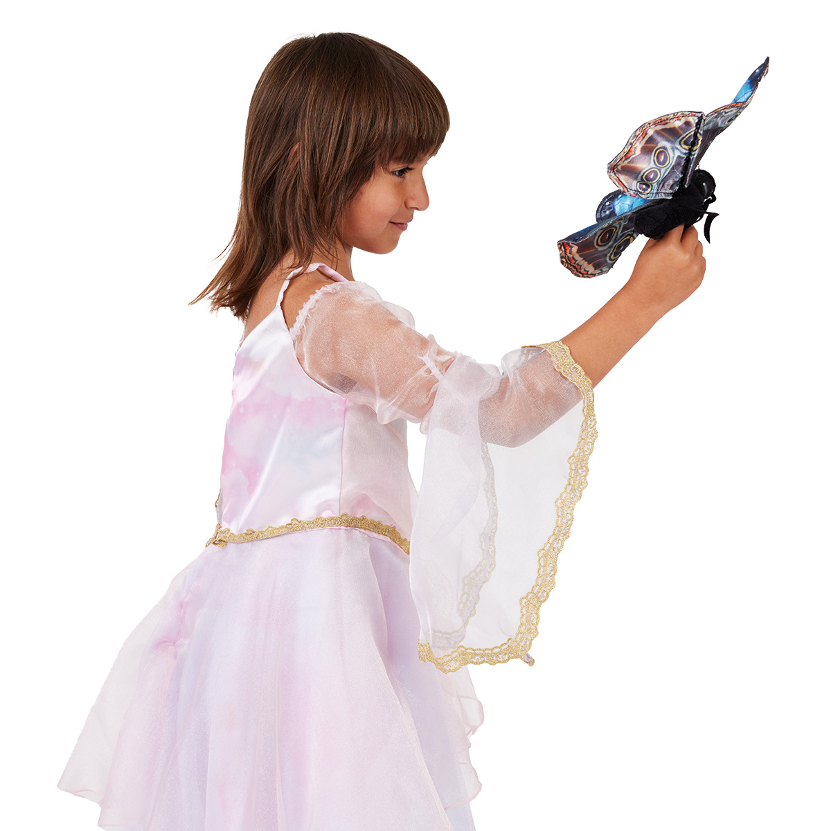 Girl in a pink fairy dress holds the Folkmanis Blue Morpho Butterfly hand puppet with blue-brown wings up in the air, side view