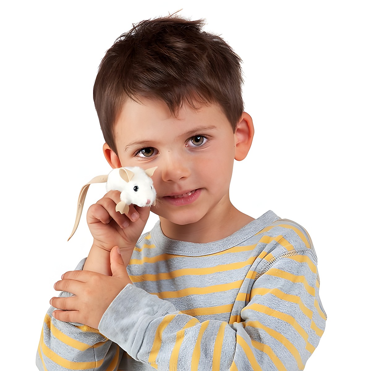 Child holding a Folkmanis mini white mouse finger puppet on their finger and smiling at the camera