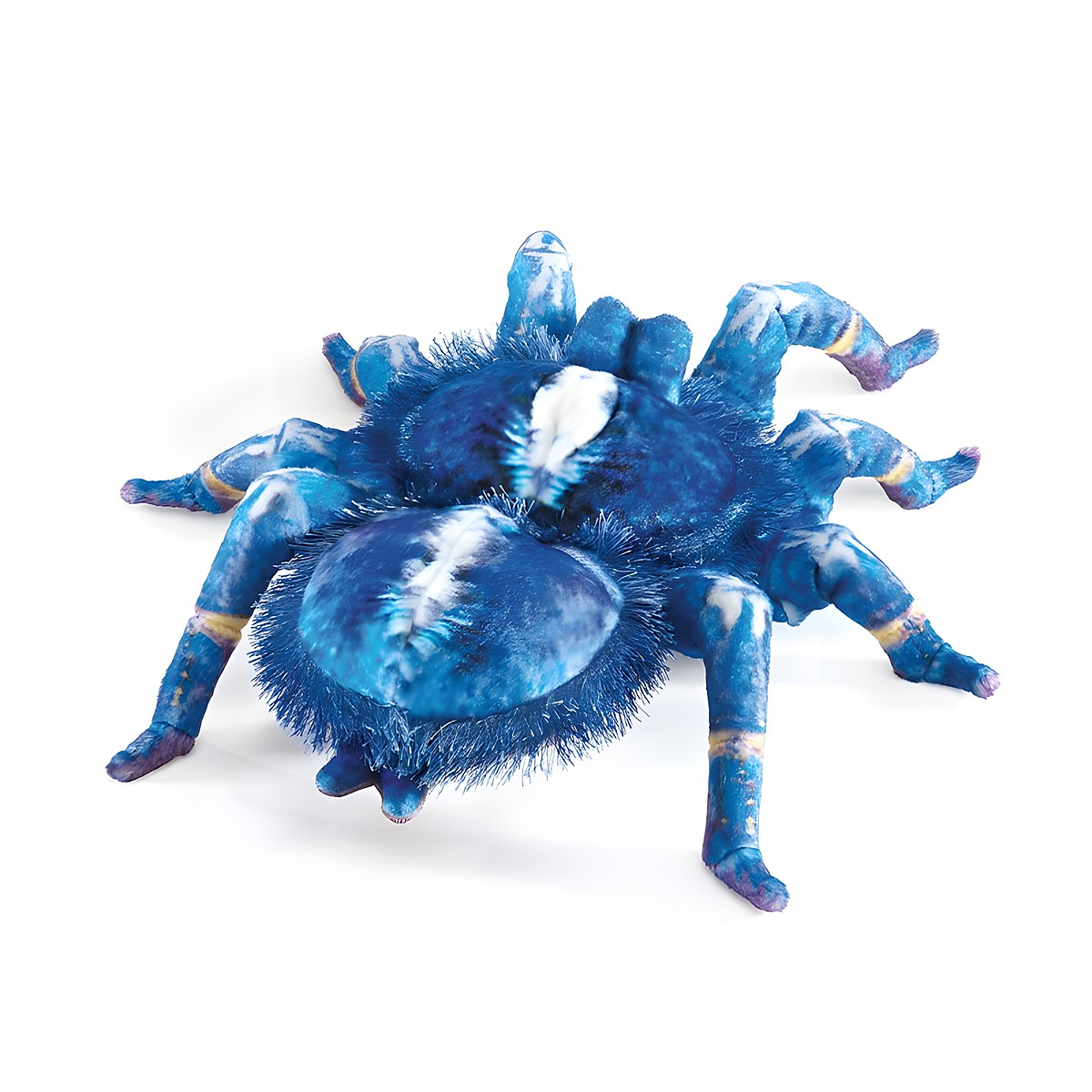 Folkmanis hand puppet blue ornament tarantula with blue and white fur pattern and eight jointed legs, angled view
