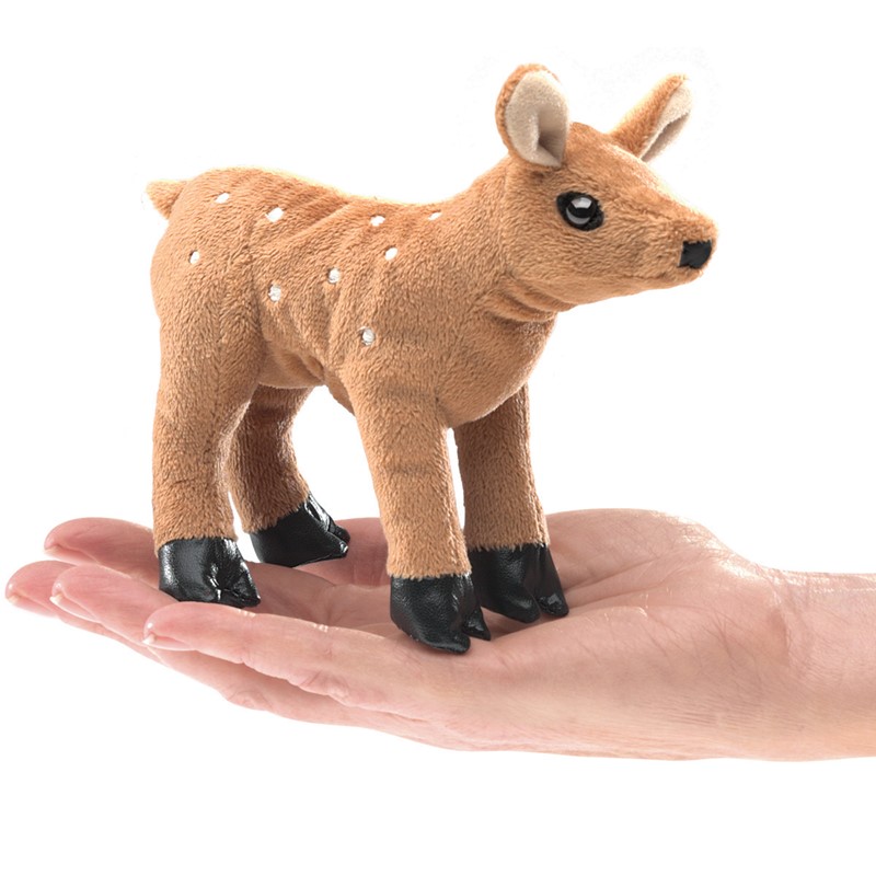 Folkmanis mini fawn finger puppet, brown with white spots and black hooves, standing on a palm