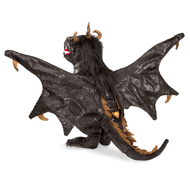 Folkmanis black dragon hand puppet with spread wings, scale texture, golden-brown horns and open mouth, shown at an angle
