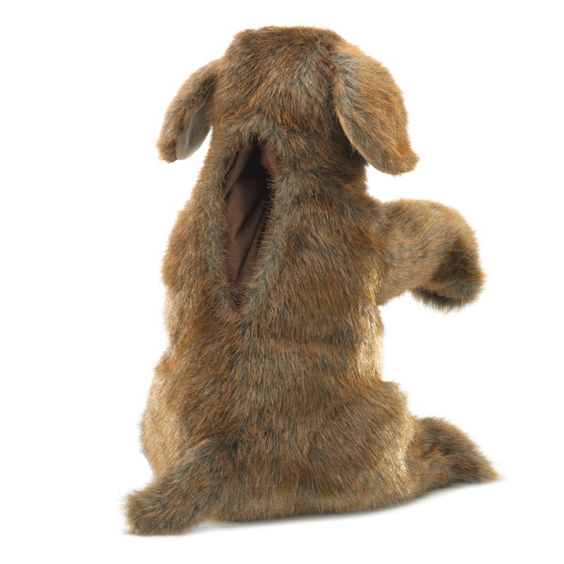 Folkmanis lop-eared dog hand puppet in brown fur, rear view showing the open hand pocket.