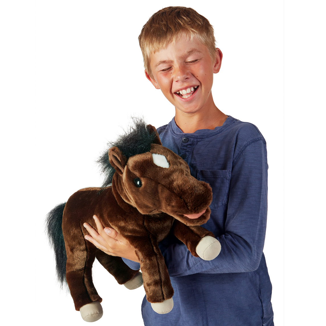 Laughing boy holding the Folkmanis horse hand puppet in dark brown with a black mane and white blaze