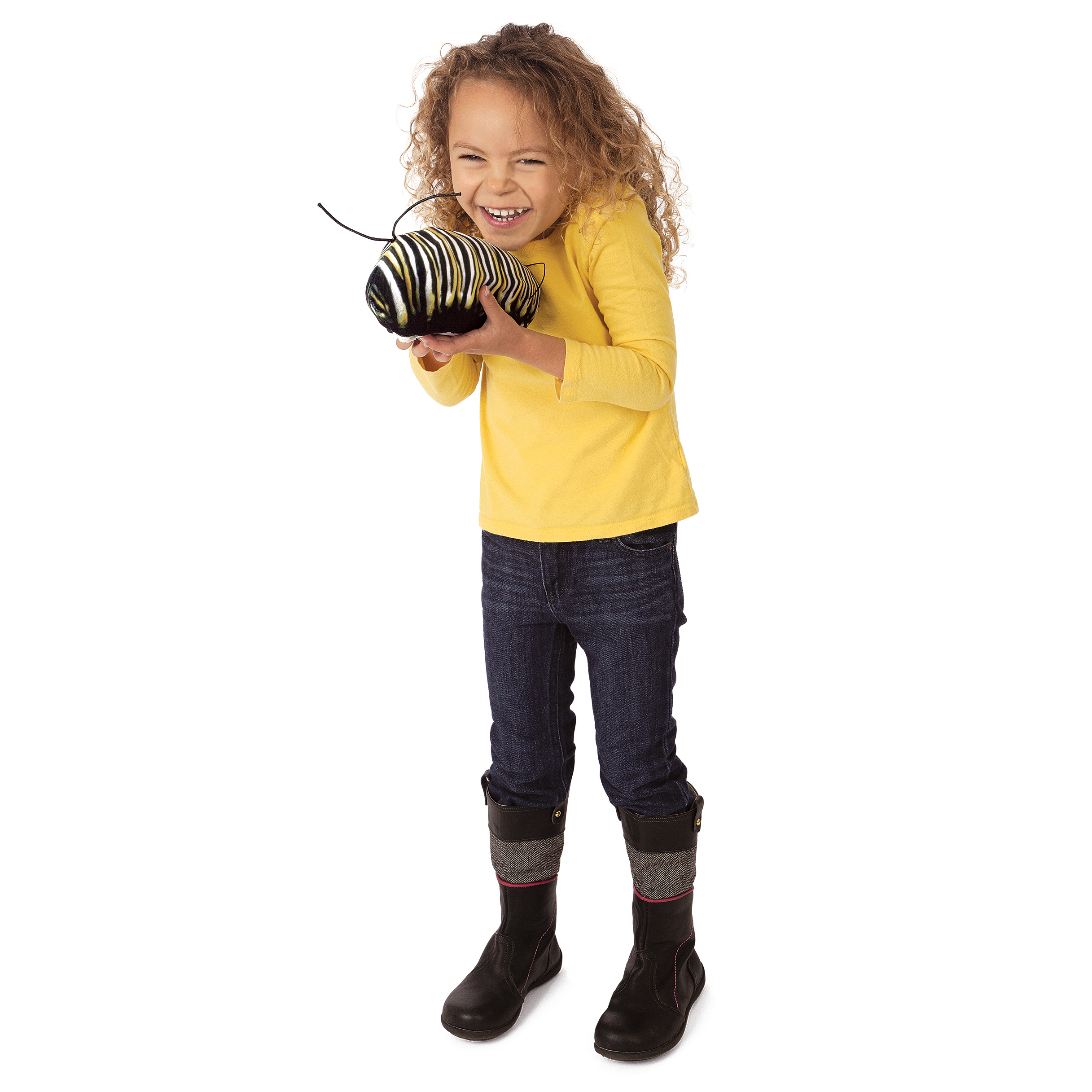 Girl laughing while holding the Folkmanis metamorphosis butterfly hand puppet with black-and-yellow stripes and antennae
