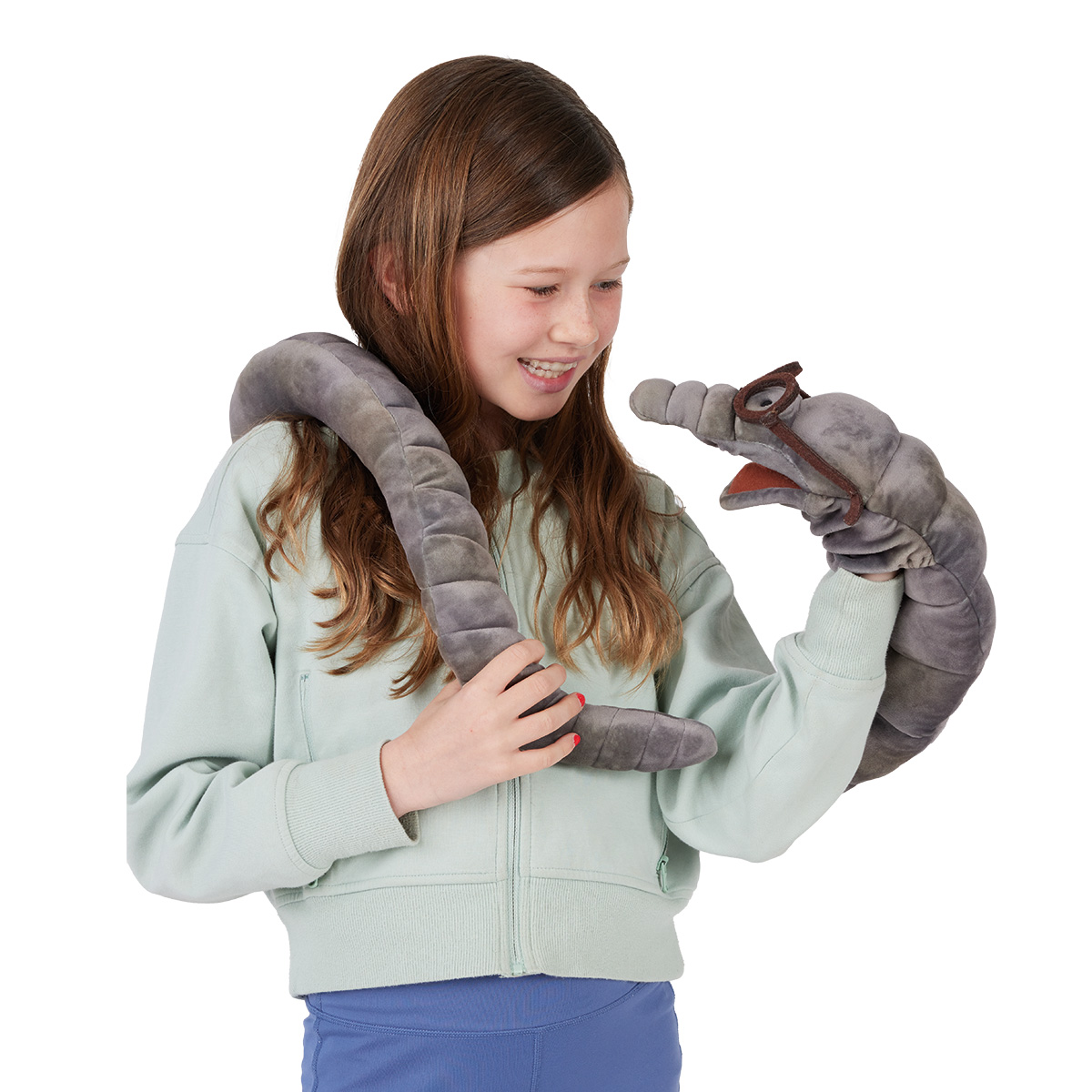 Girl holding a grey Folkmanis bookworm hand puppet with glasses, its long body draped over her shoulder