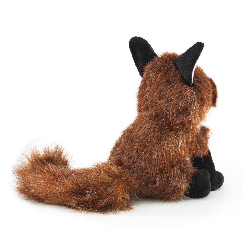 Folkmanis mini fox finger puppet shown from behind: red-brown fur, bushy tail, black paws and ears