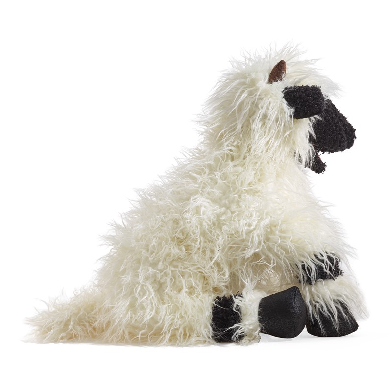 Folkmanis hand puppet Valais Blacknose Sheep with white shaggy fur and black face, shown seated in side view