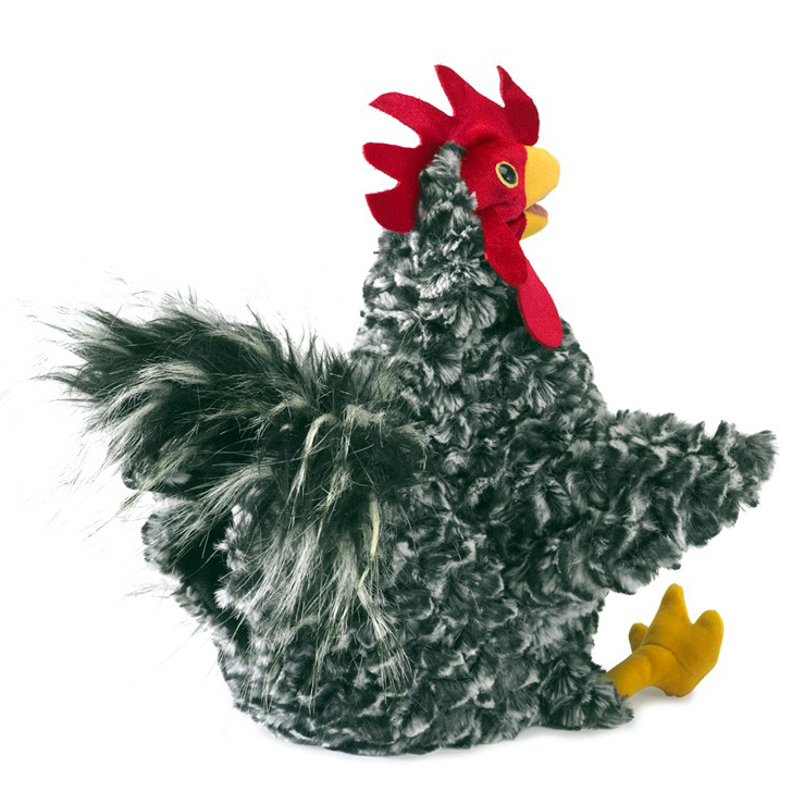 Folkmanis hand puppet rooster with black-and-white shaggy plumage, red comb and yellow claws, shown from the side
