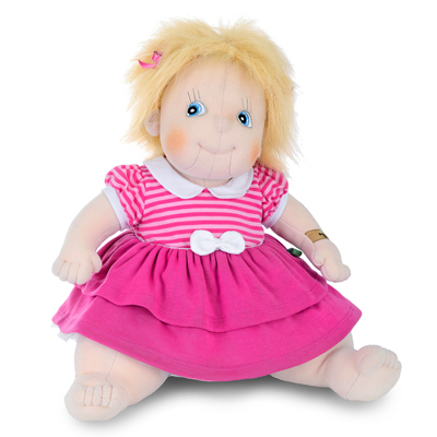Rubens Barn Original doll Ida with blond hair and a pink dress with white bow, sitting