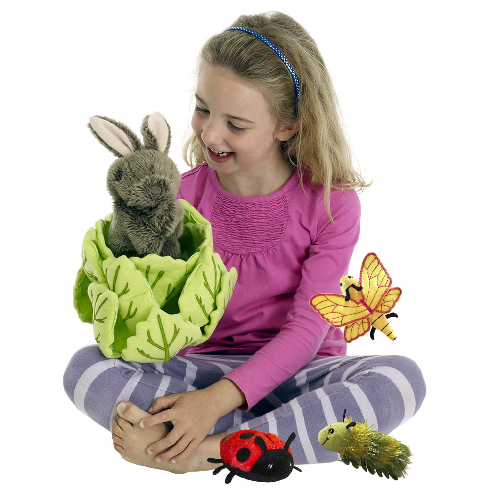 Girl playing with the The Puppet Company rabbit in lettuce hand puppet, usage example